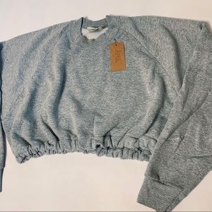 Gray cropped cinched waist distressed sweatshirt